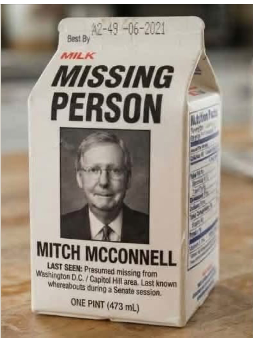 A milk carton printed with a missing-person notice for Mitch McConnell.